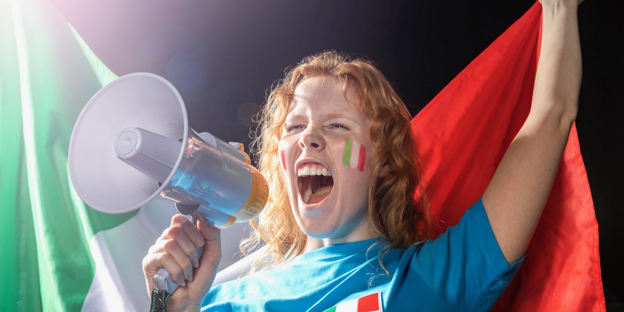 woman-holding-italian-flag-speaking-megaphone